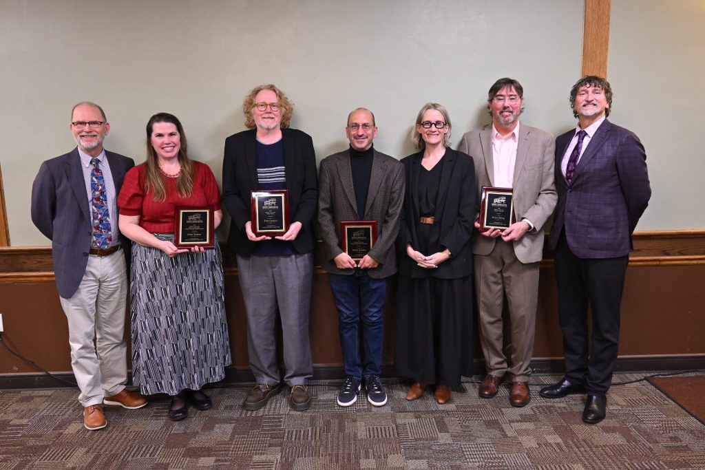 2025 scholars of the year and their deans.